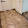 Herringbone flooring with border and tramline by Fin Wood Ltd London