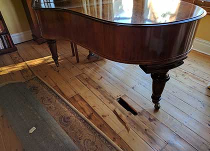 This pine floor was unable to take the weight of the grand piano