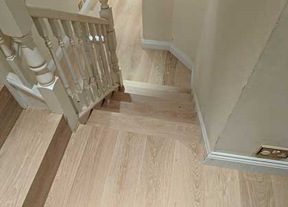 With three set of stairs and landings this was a complex installation