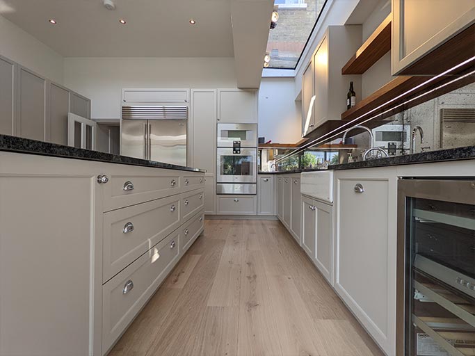 We aligned the floorboards to fit symmetrically against the kitchen units #CraftedForLife