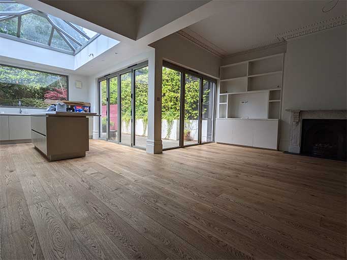 This whole house project involved installing a new oak floor in the bright open plan kitchen diner #CraftedForLife