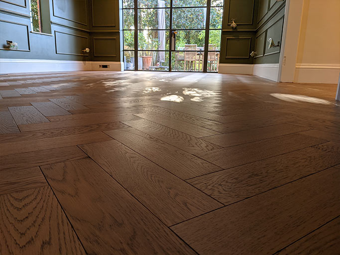 Elegant herringbone parquet floor made from classic engineered oak blocks #CraftedForLife