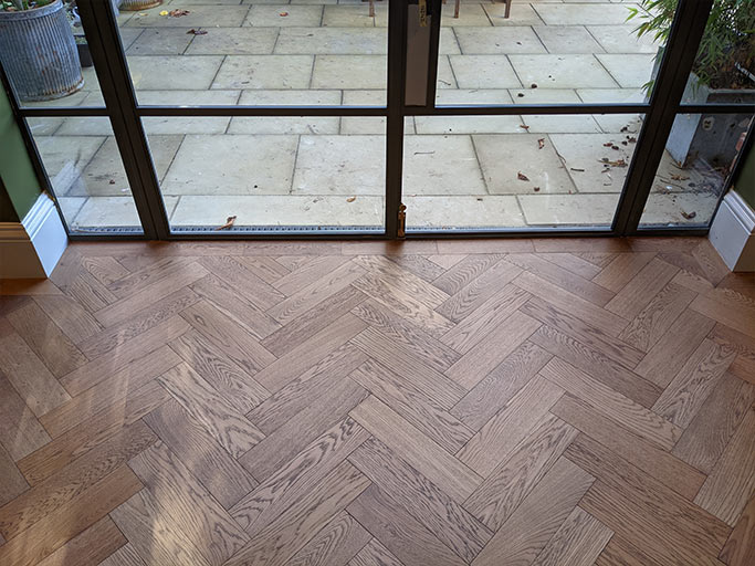 Elegant herringbone parquet floor made from classic engineered oak blocks #CraftedForLife