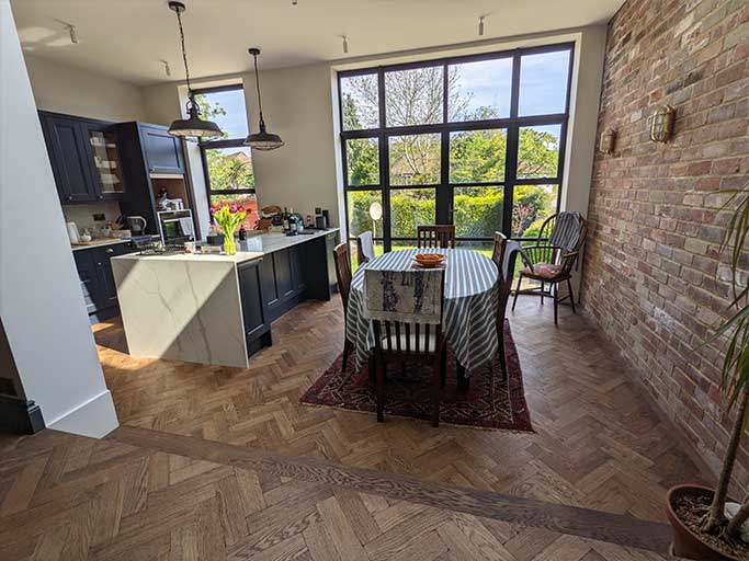 The antique oak herringbone parquet also perfectly suits the modern extension #CraftedForLife