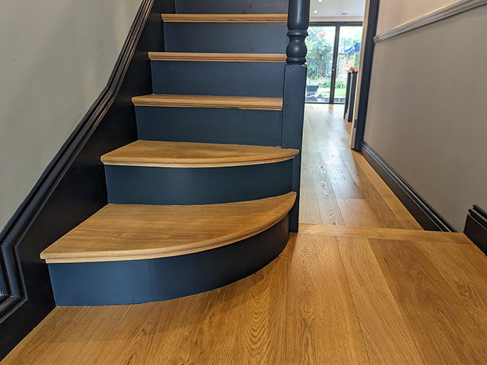Classic oak stair cladding with a feature herringbone parquet #CraftedForLife