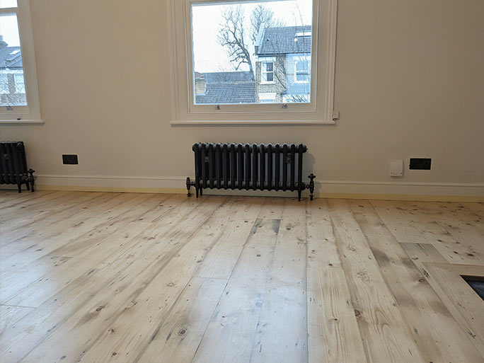 Decades of natural ageing have given the reclaimed pine flooring its rich, warm patina #CraftedForLife