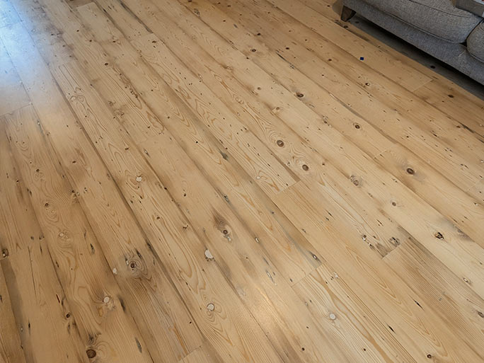 Knots, subtle wear marks, and areas of tonal variation all contributed to the floor's authentic appearance #CraftedForLife