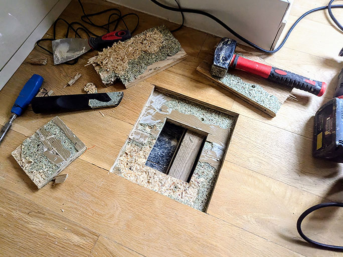 Cutting inspection pockets to map subfloor heights #CraftedForLife