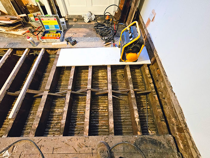 Removing pine floorboards in controlled sections #CraftedForLife