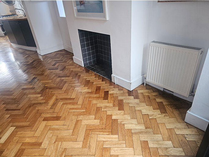 The existing herringbone flooring was restored #CraftedForLife