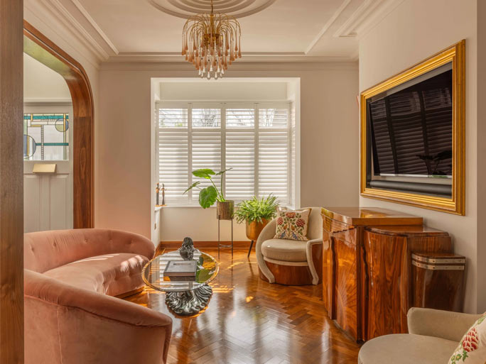 The front living room showcases the high gloss walnut herringbone parquet #CraftedForLife